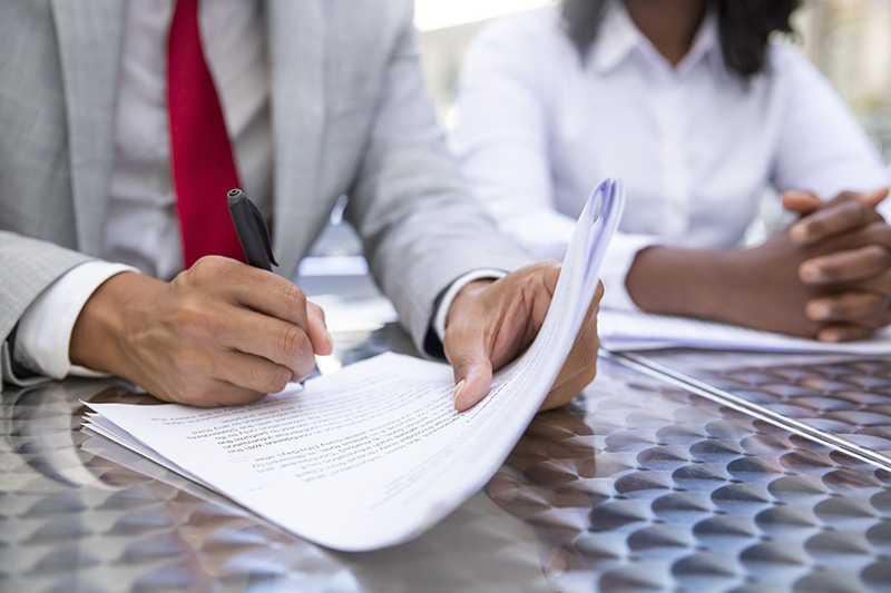 Closeup shot of businessman signing documents